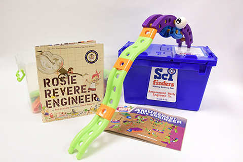 Engineering Sci-finders kit with activities and experiments including a toy coaster in front of a blue container