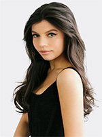 Alex Aster headshot with her dark brown hair down, black sleeveless dress in front of a white background