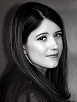  Alexandra Bracken black and white headshot of her looking over her right shoulder