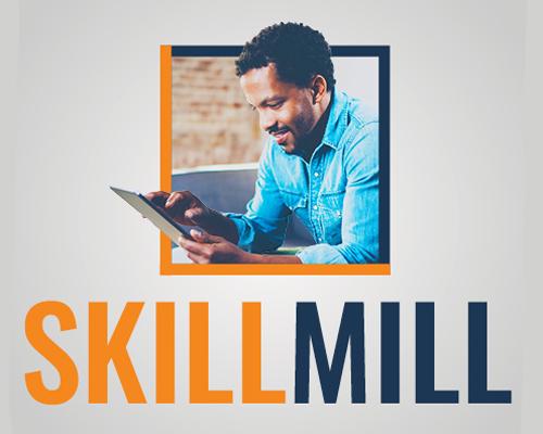 Skill Mill, African American man holding a tablet